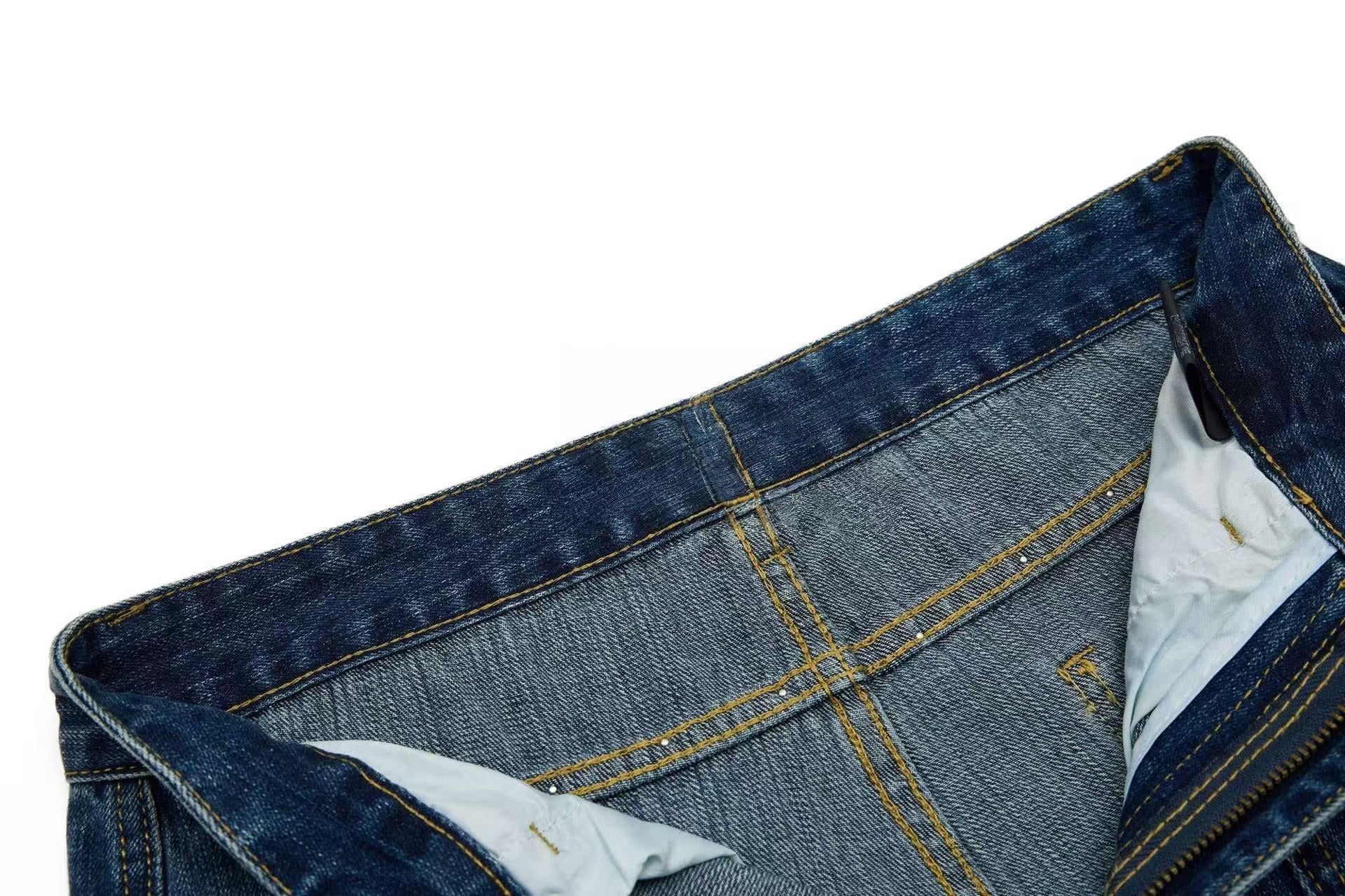 CapCabin “Studded Panel Denim Jeans”