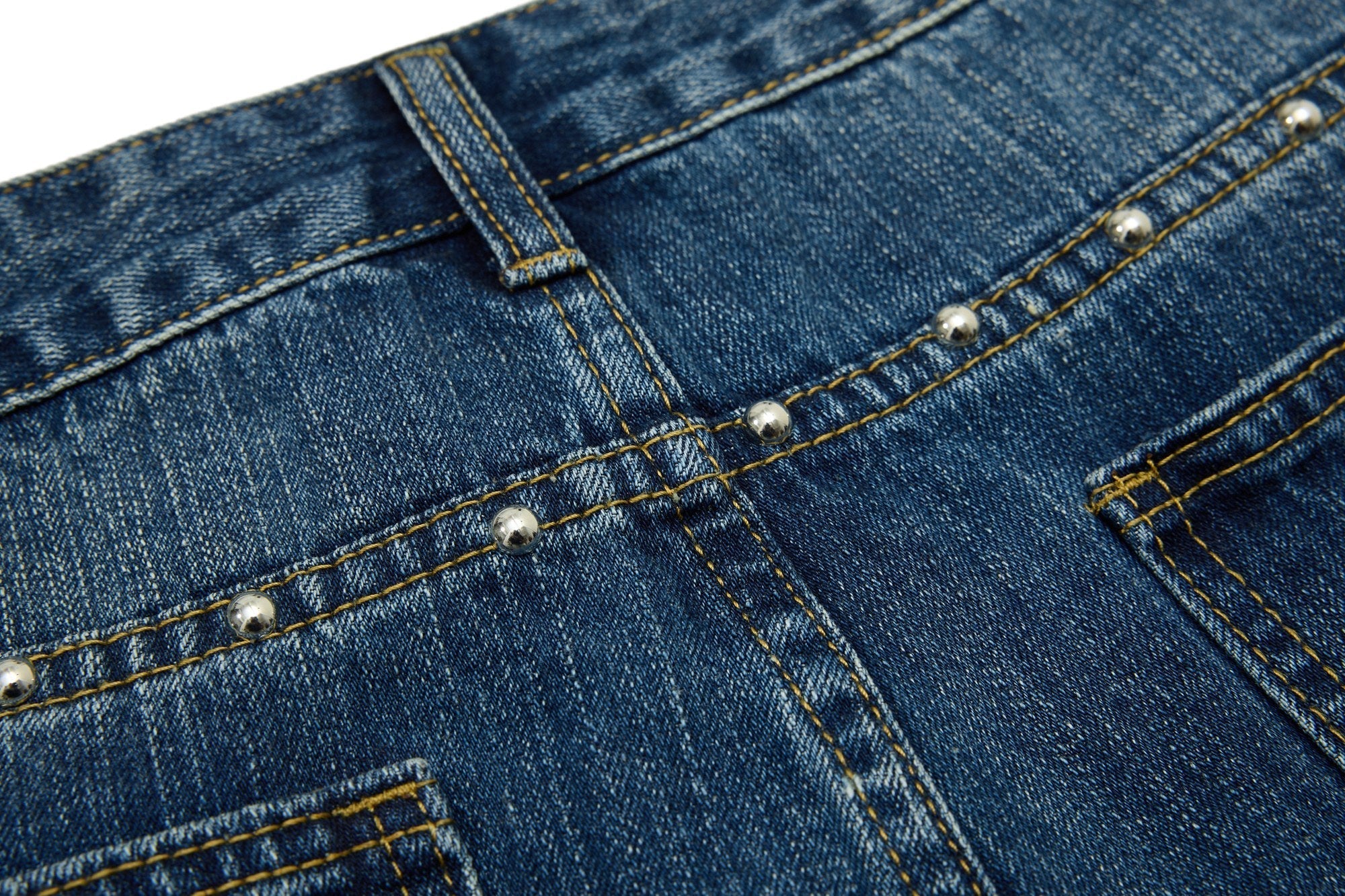 CapCabin “Studded Panel Denim Jeans”