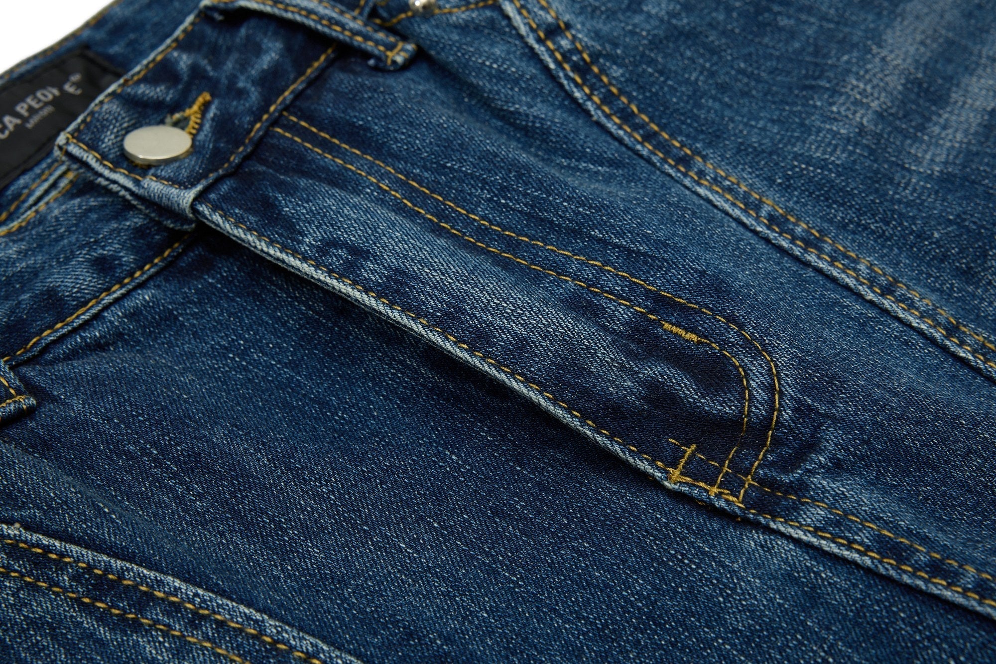 CapCabin “Studded Panel Denim Jeans”