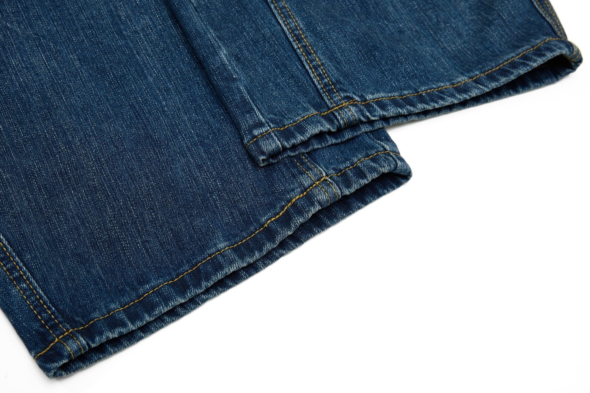 CapCabin “Studded Panel Denim Jeans”