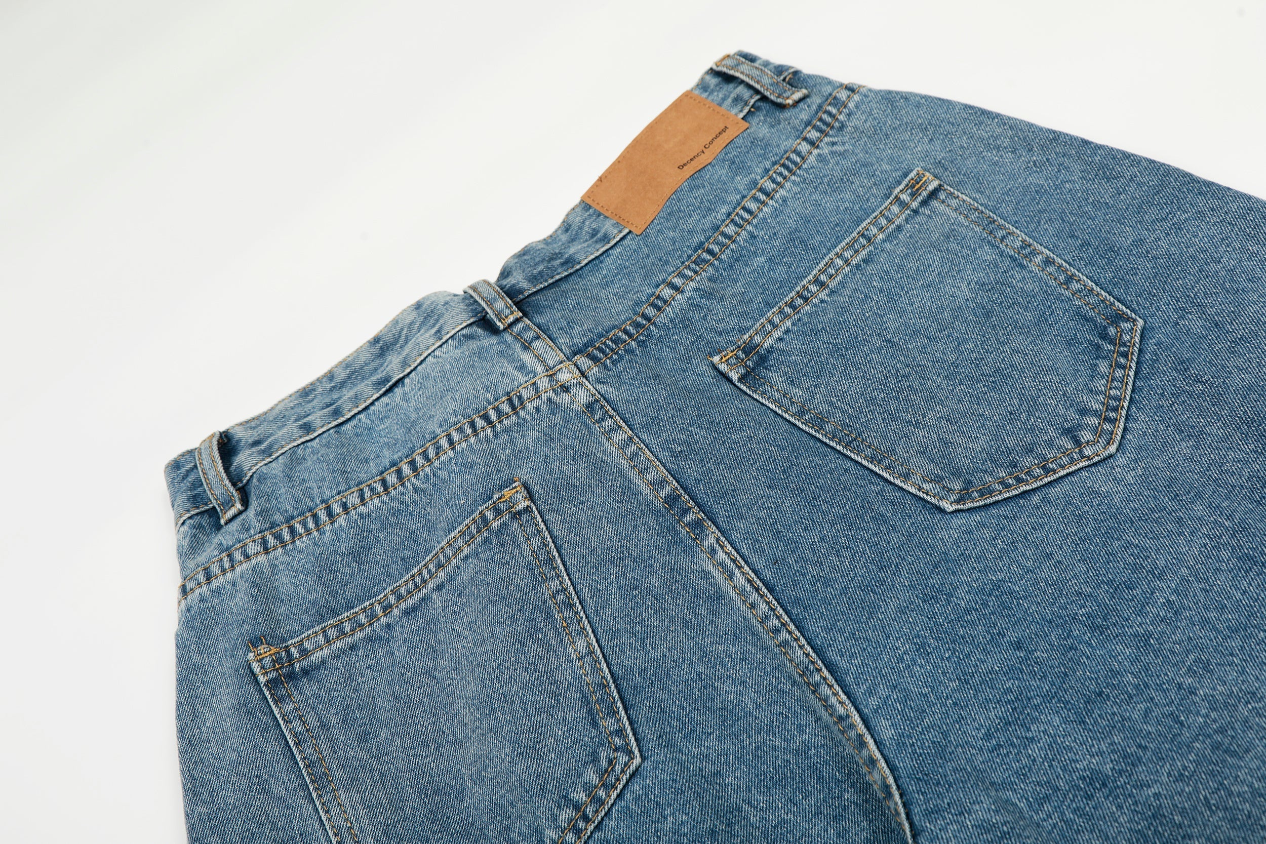 CapCabin Asymmetric Waist Wide-Leg Denim Pants