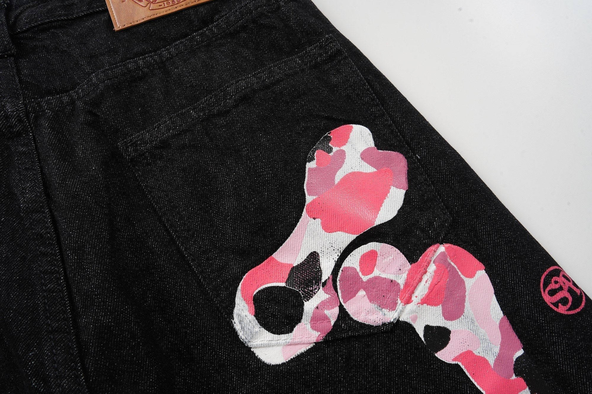 CapCabin Skeleton Graphic Wide-Leg Denim Pants