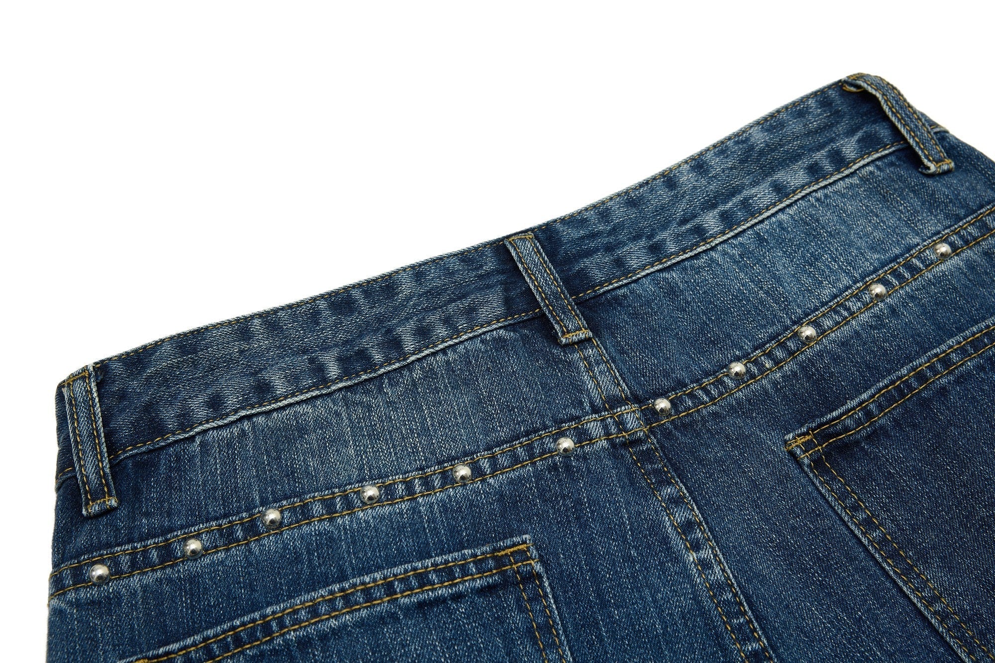 CapCabin “Studded Panel Denim Jeans”