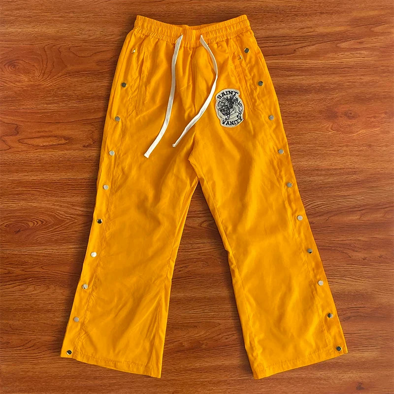 SAINT VANITY Embroidered Rivet Sports Style Casual Windbreaker Pants - Yellow