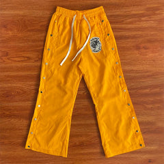 SAINT VANITY Embroidered Rivet Sports Style Casual Windbreaker Pants - Yellow