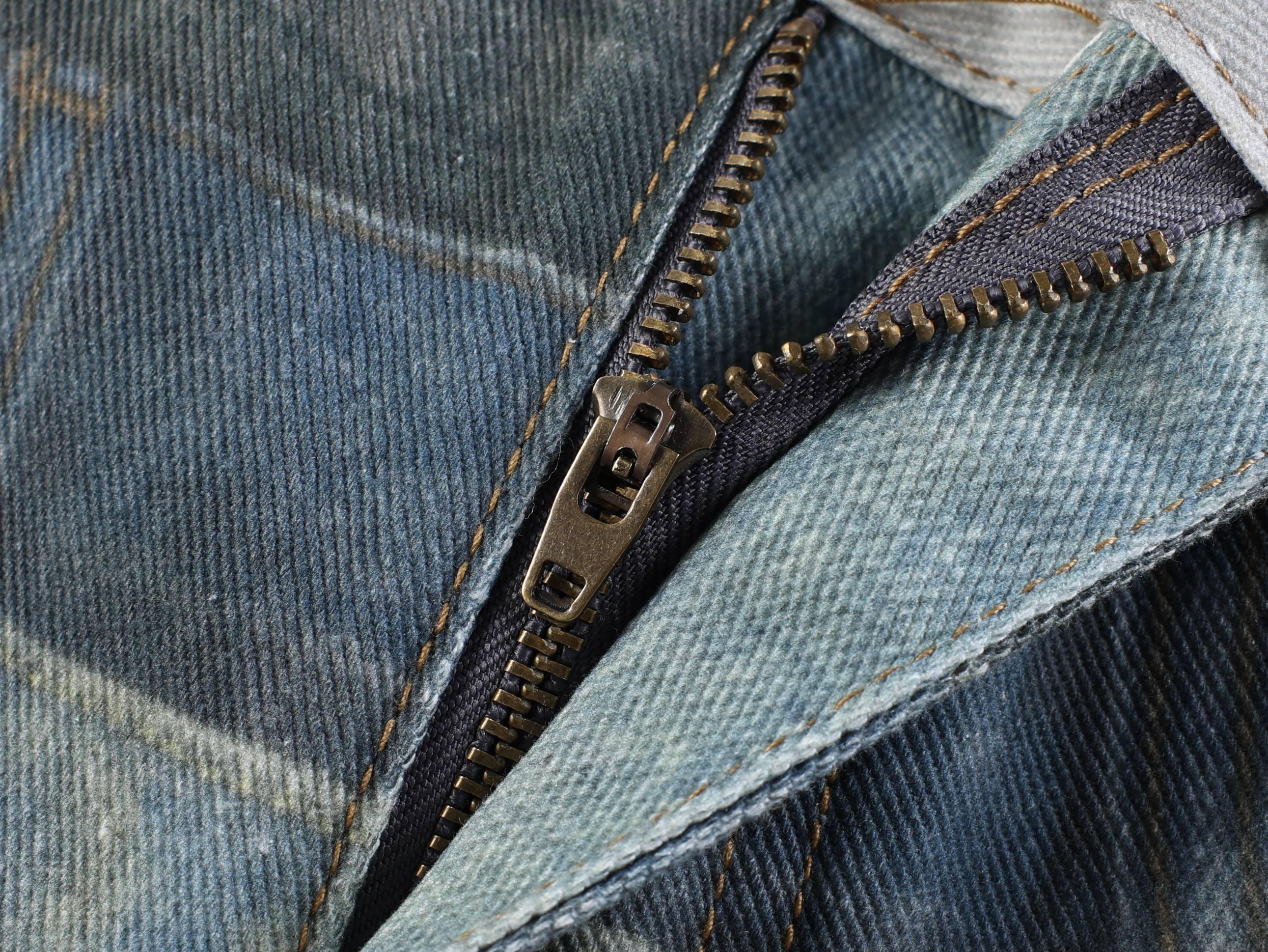 CapCabin “Layered Fade Distressed Balloon Jeans”