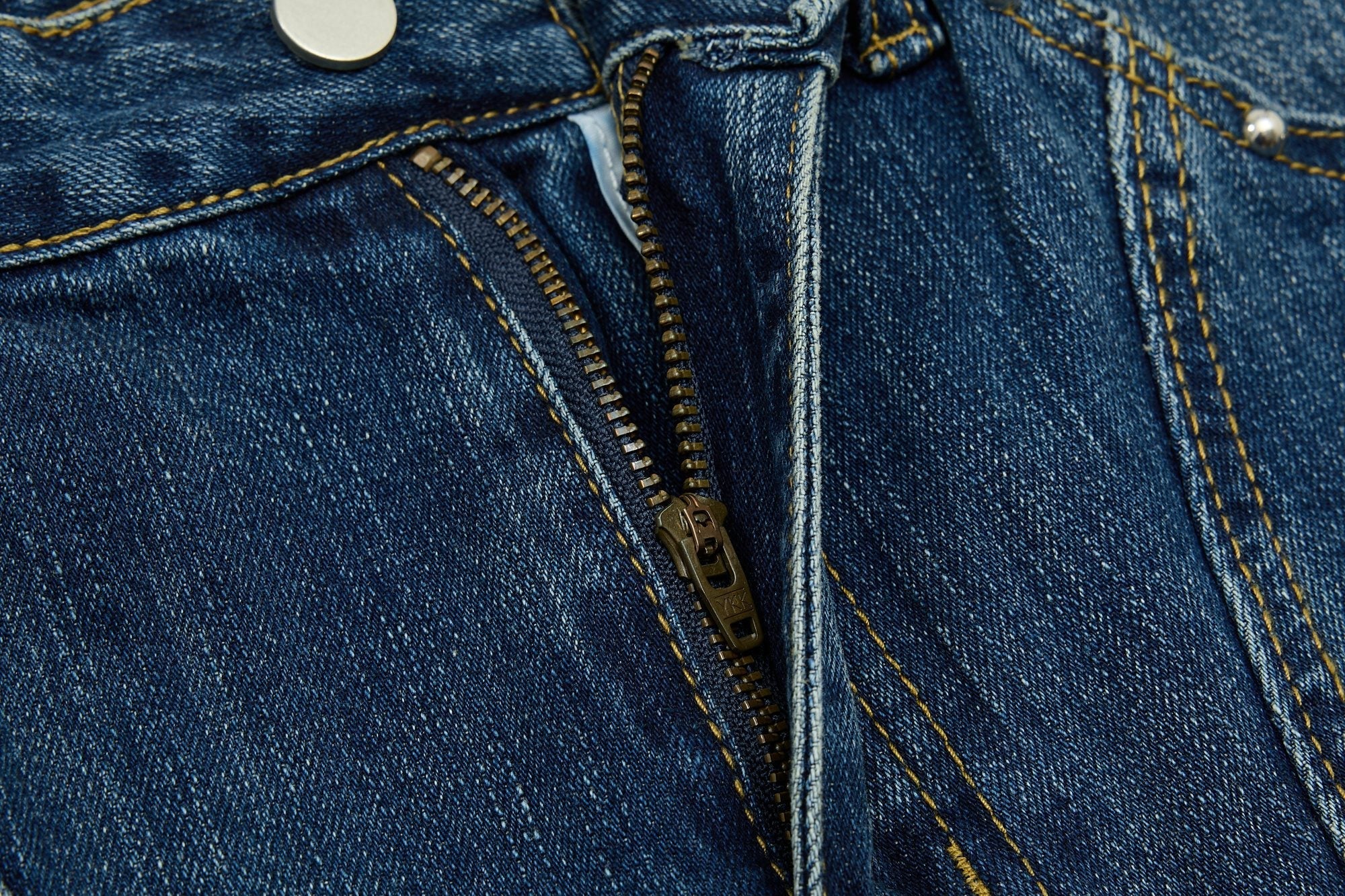 CapCabin “Studded Panel Denim Jeans”