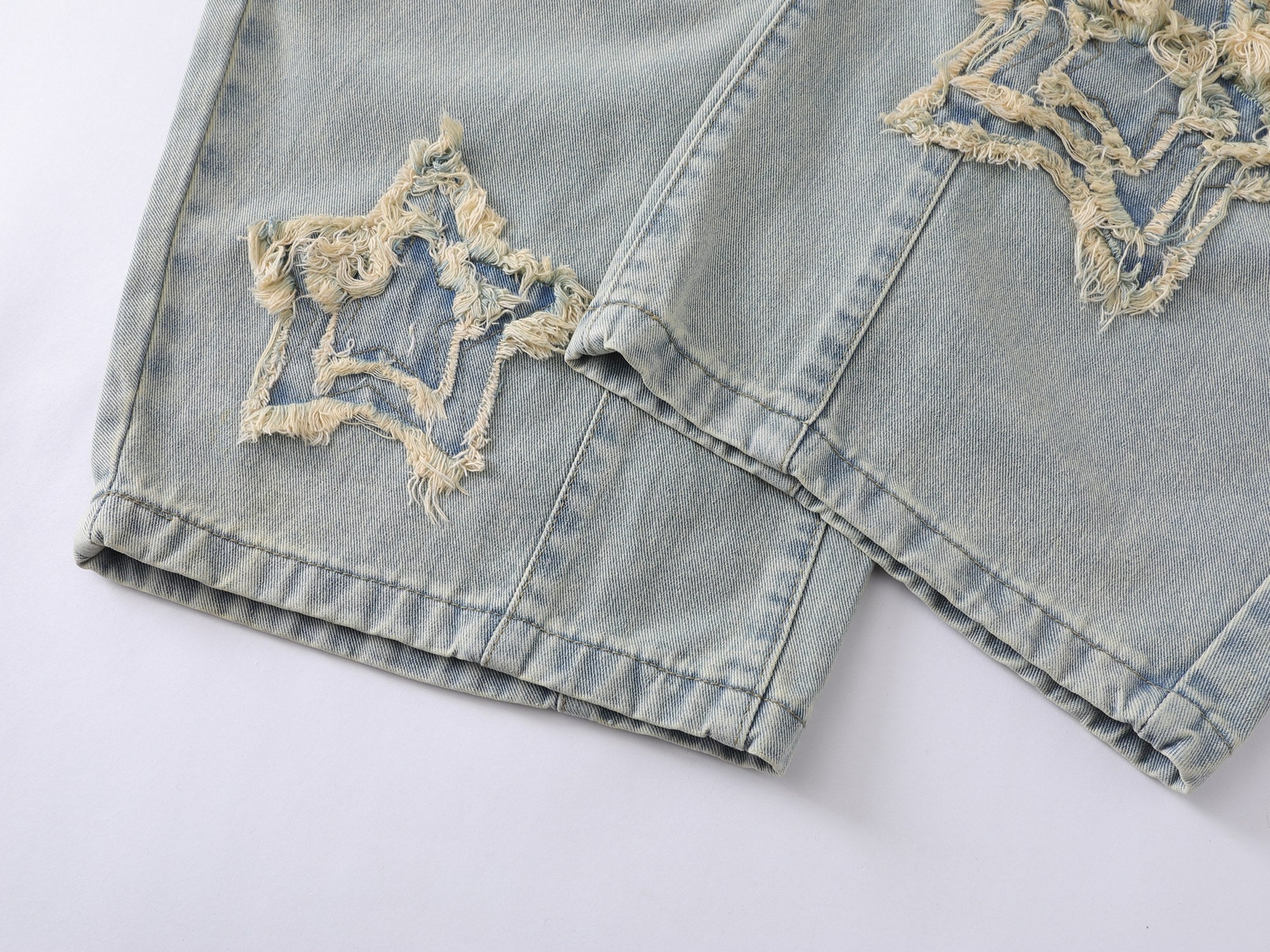 CapCabin “Star Distressed Wide-Leg Jeans”