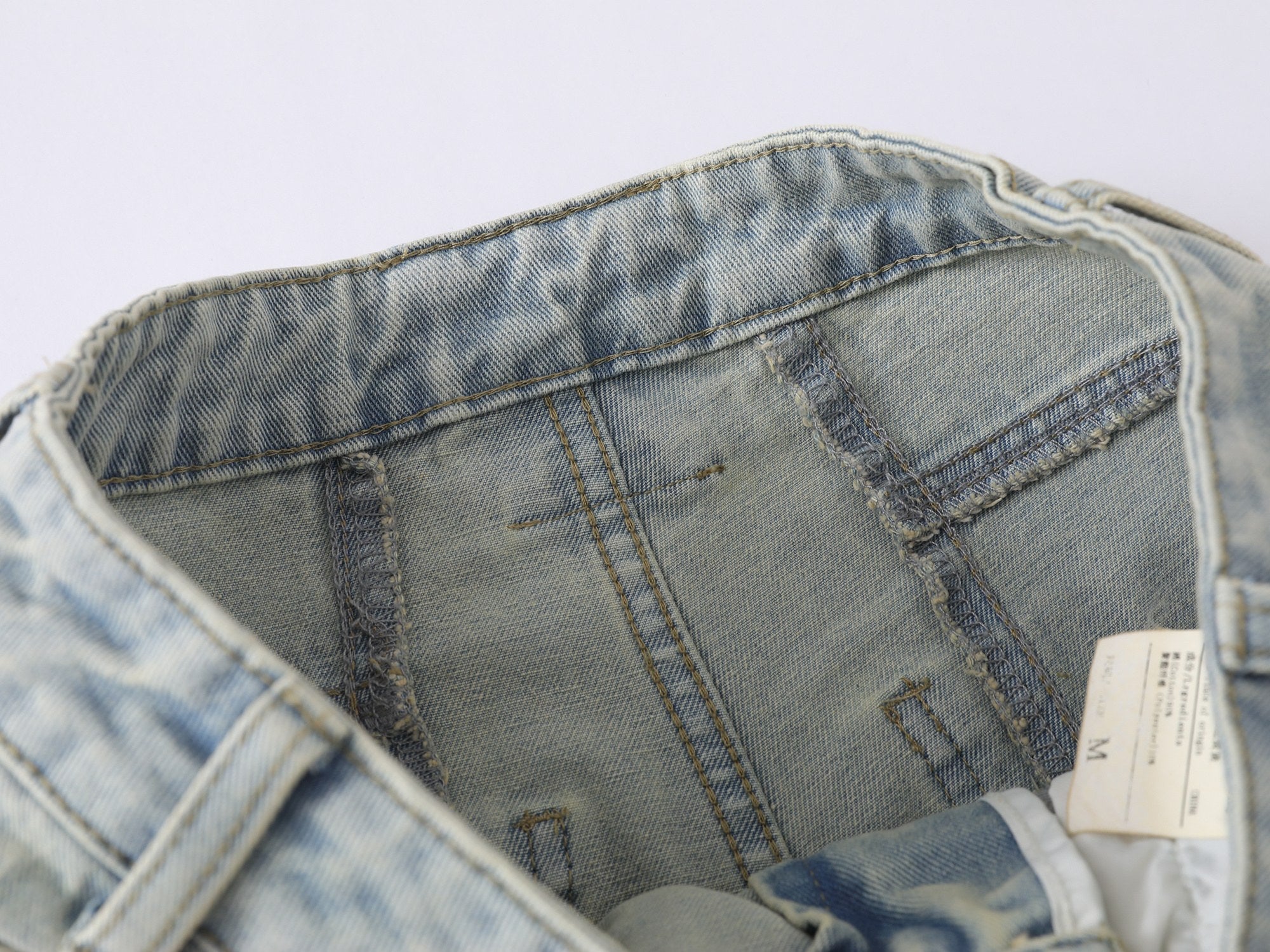 CapCabin “Star Distressed Wide-Leg Jeans”