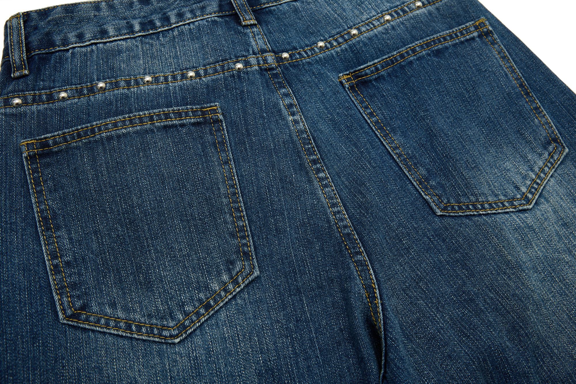 CapCabin “Studded Panel Denim Jeans”