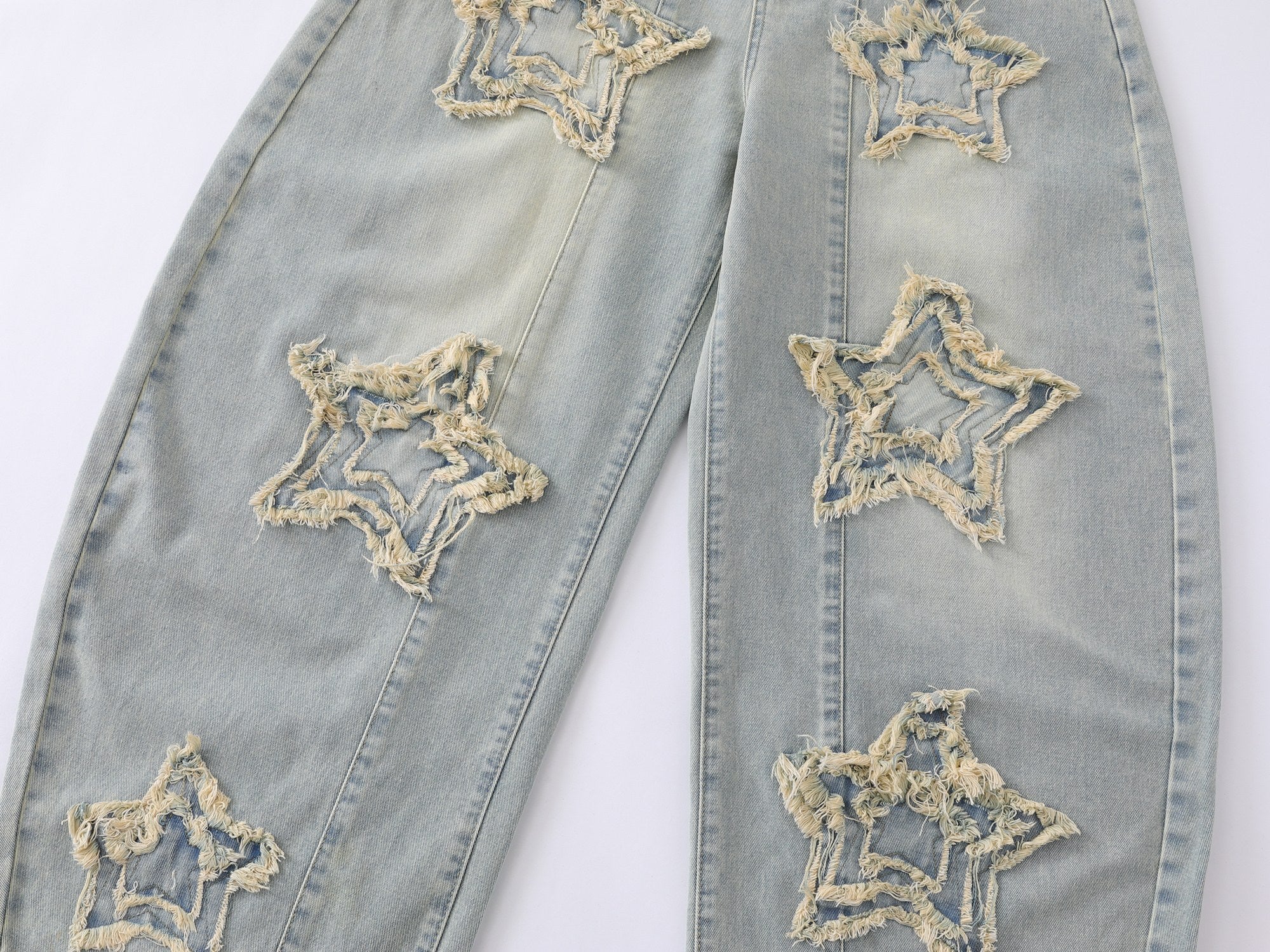 CapCabin “Star Distressed Wide-Leg Jeans”