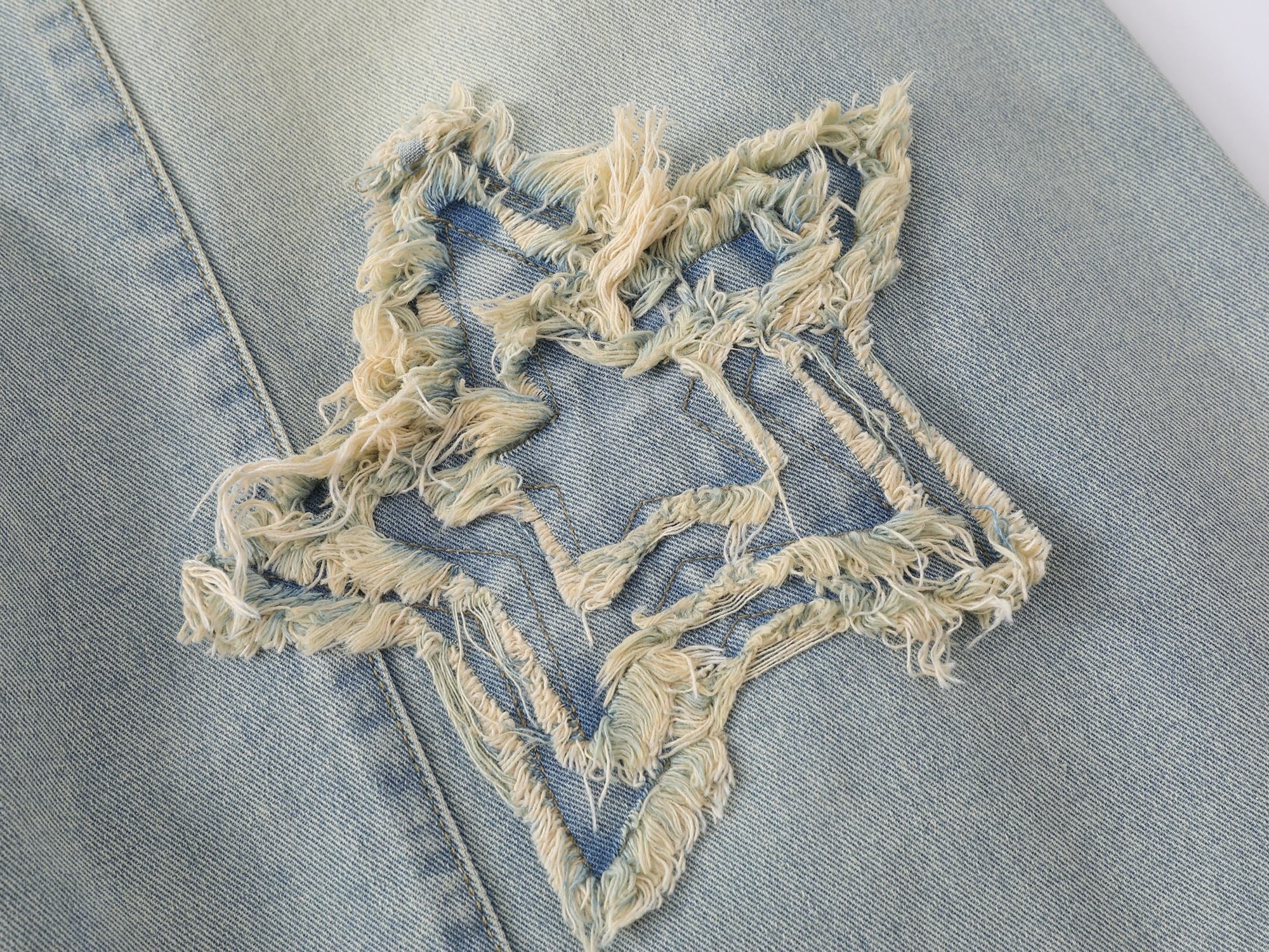 CapCabin “Star Distressed Wide-Leg Jeans”