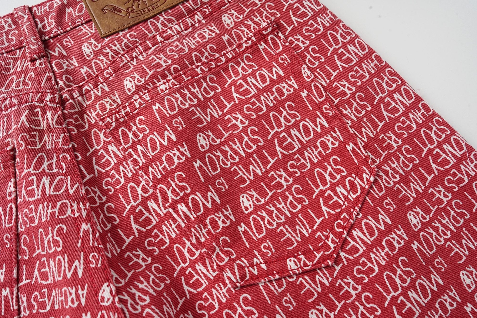 CapCabin All-Over Script Print Wide-Leg Pants